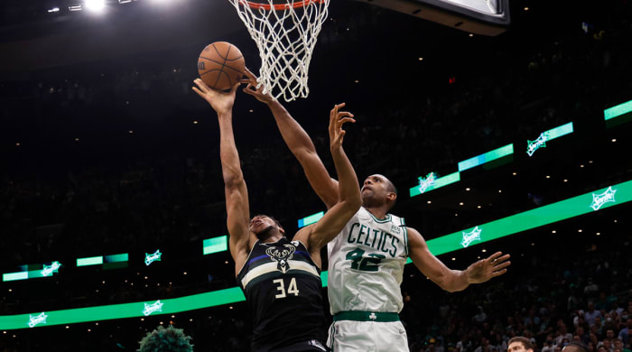 Celtics center Al Horford (42) blocks a shot by Bucks forward Giannis Antetokounmpo (34) during the second half of Game 7 of the second round of the 2022 NBA playoffs at TD Garden